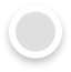 A simple graphic of a white circle with a subtle grey shadow, suggesting a three-dimensional button or icon, set against a light grey background.